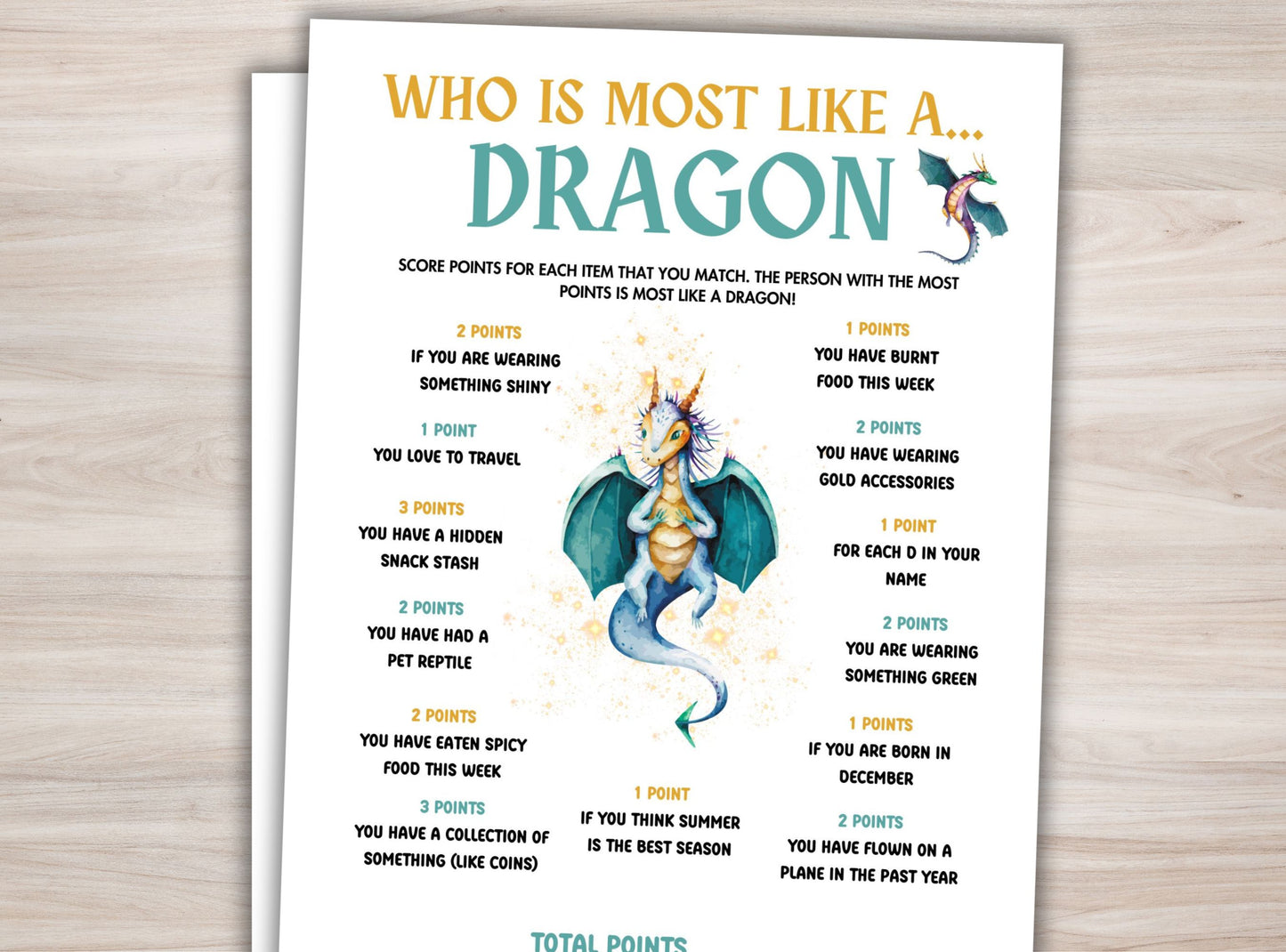 Sheet with 'Who is most like a dragon' questionnaire on a wooden surface