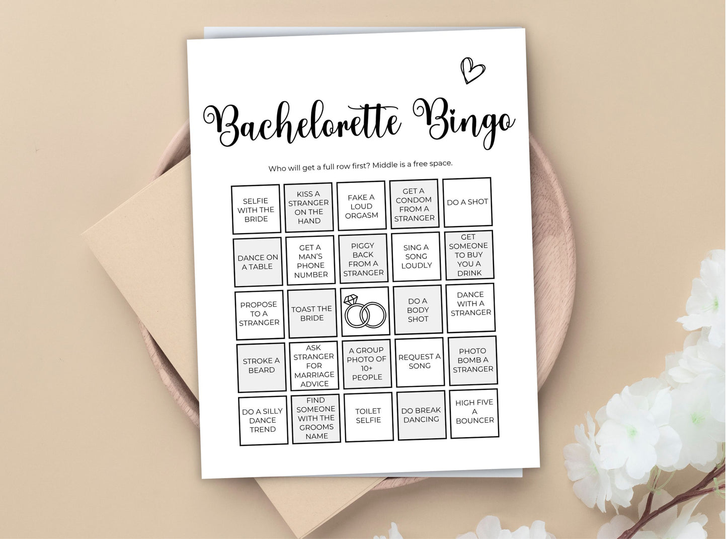 Bachelorette Bingo card on a beige background with a heart symbol