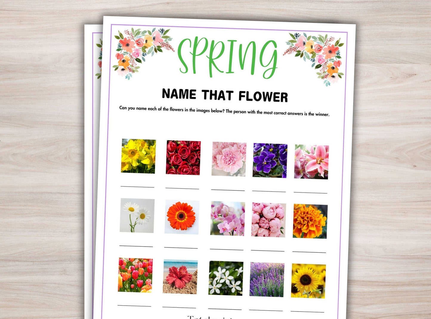 Sheet with 'Spring Name That Flower' activity on a wooden surface