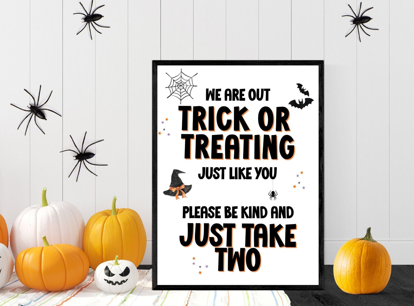 Halloween-themed poster with text and pumpkins on a wooden background