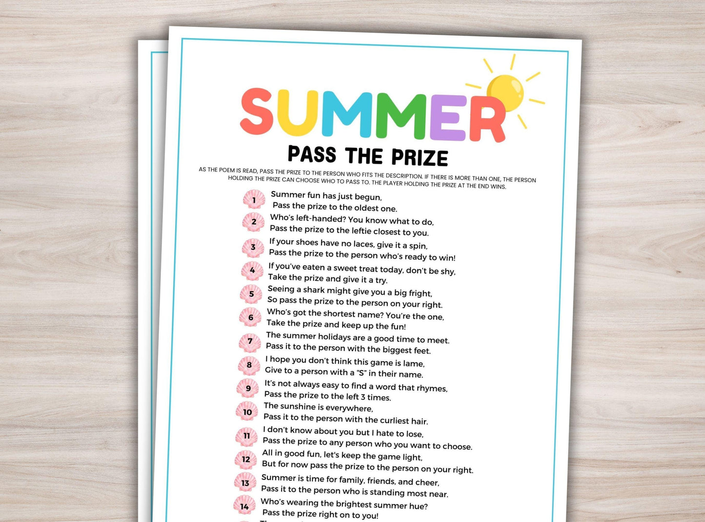 Sheet of paper with 'Summer Pass the Prize' game instructions on a wooden surface