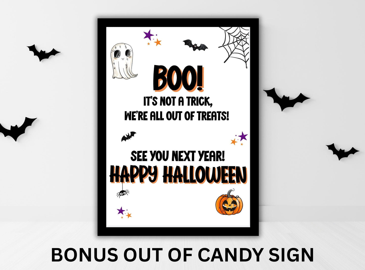 Halloween sign with text 'BOO! It's not a trick, we're all out of treats! See you next year! Happy Halloween!' on a white background with decorative elements.