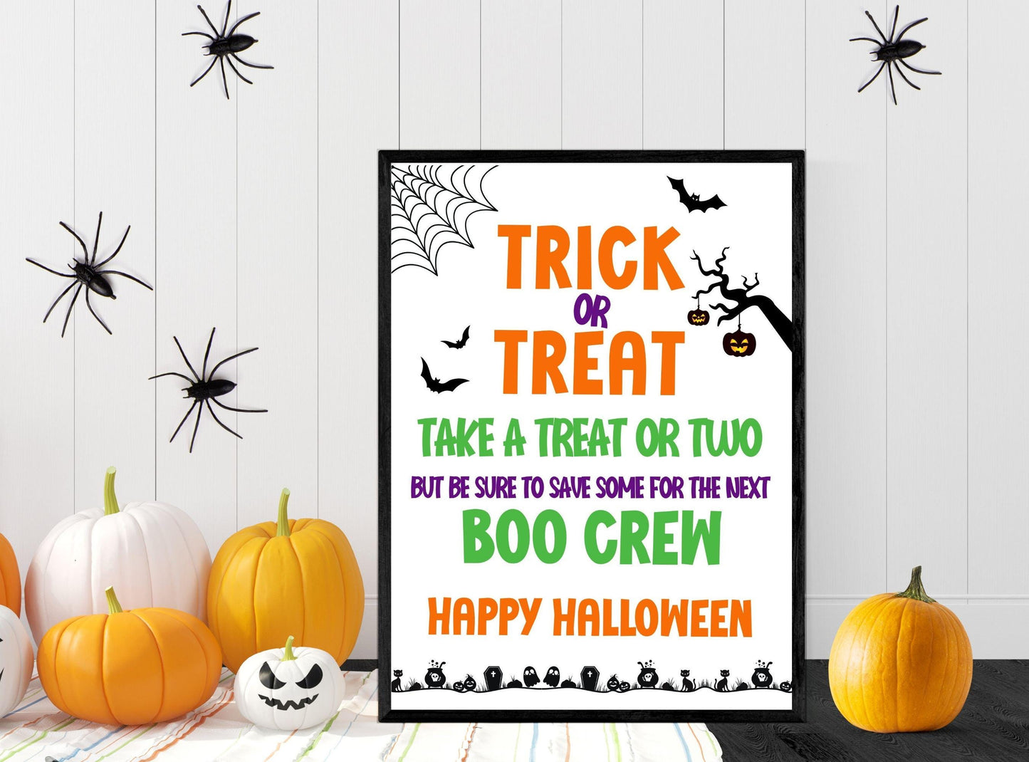 Halloween-themed poster with text 'Trick or Treat' and pumpkins on a wooden surface.