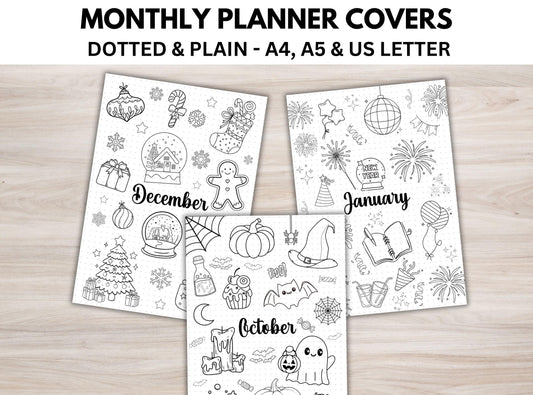 Three monthly planner covers for December, January, and October on a wooden surface.