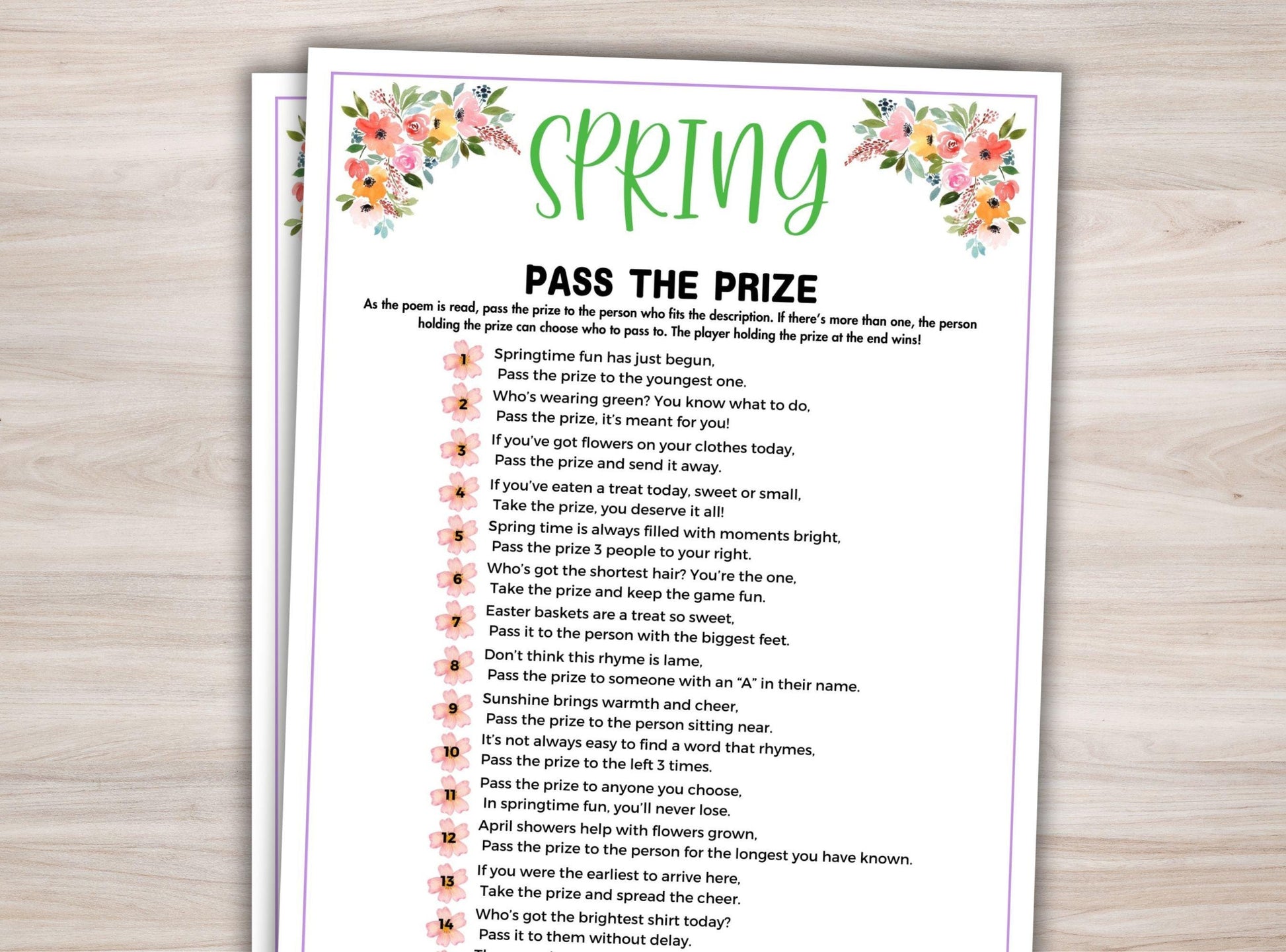Sheet of paper with 'Pass the Prize' game instructions on a wooden surface