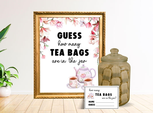 Decorative sign with tea-themed text and a jar of tea bags on a light wooden floor.